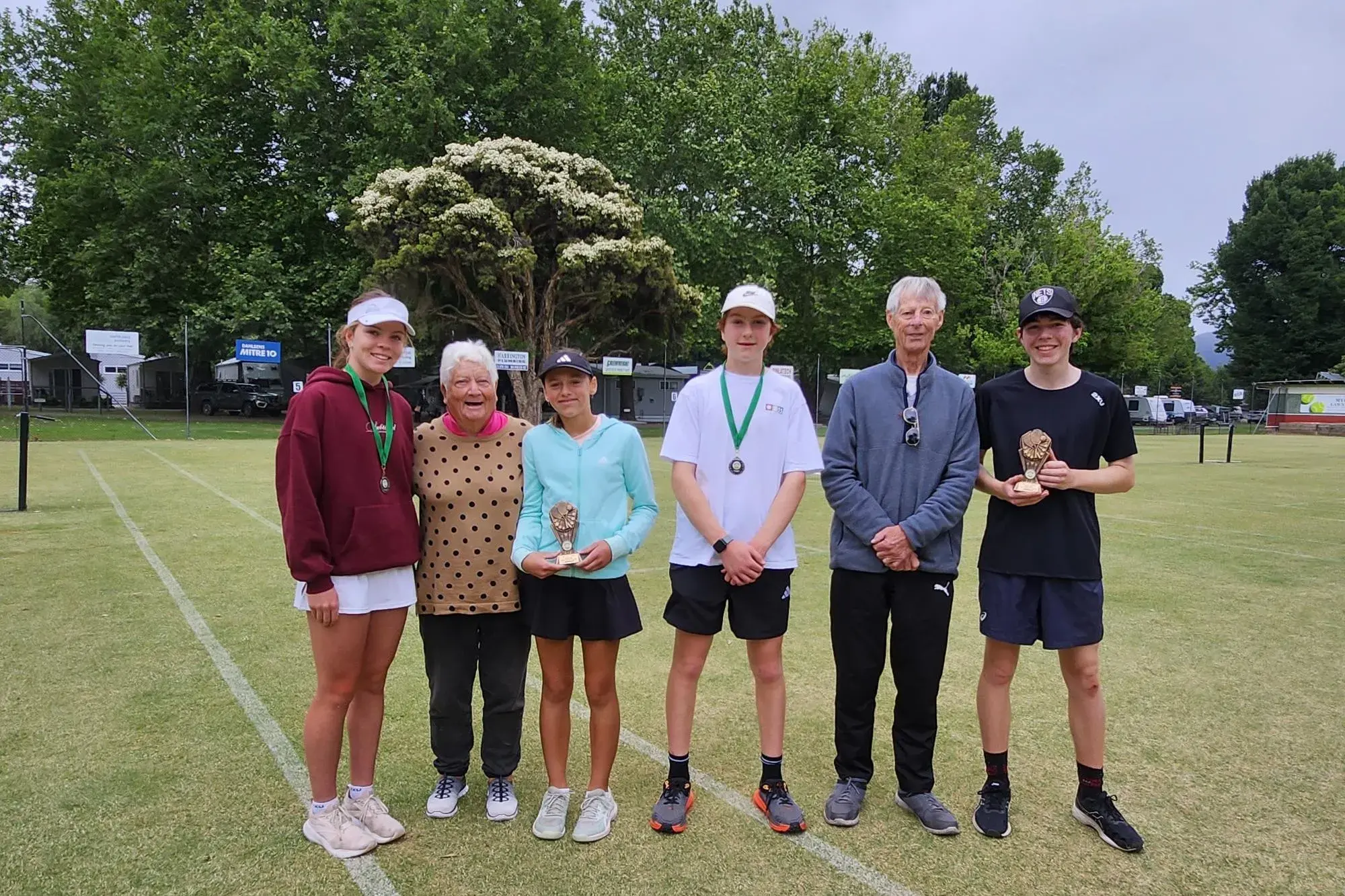 <p>WINNERS: (from left) Milla Corcoran (runner up), Vicki Moore, Ingrid Barnard (winner), Elliot Ford (runner up), Alan Heberle and Rylan Frecklington (winner) after the Myrtleford Lawn Tennis Club\\'s Open Age Junior Club Championships. </p>\\n