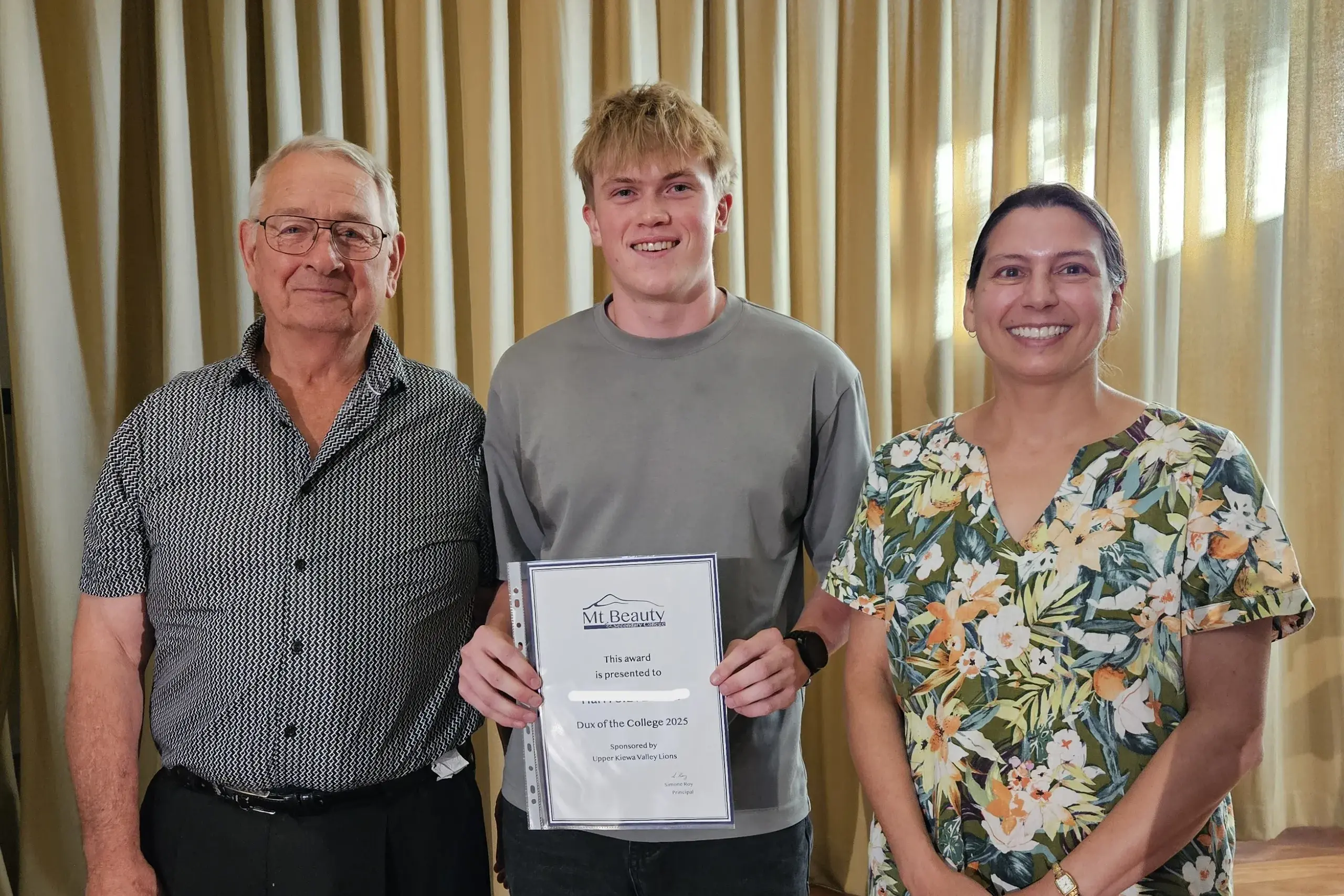 <p>AWARDS EVENING ACCOMPLISHMENT: Mount Beauty Lion\\u2019s Club representative Rod Hyde (left), 2025 Dux for Mount Beauty Secondary College Harri Silvester and principal Simone Roy celebrated the end of a fantastic school year for Mount Beauty. PHOTO: Mount Beauty Secondary College</p>\\n