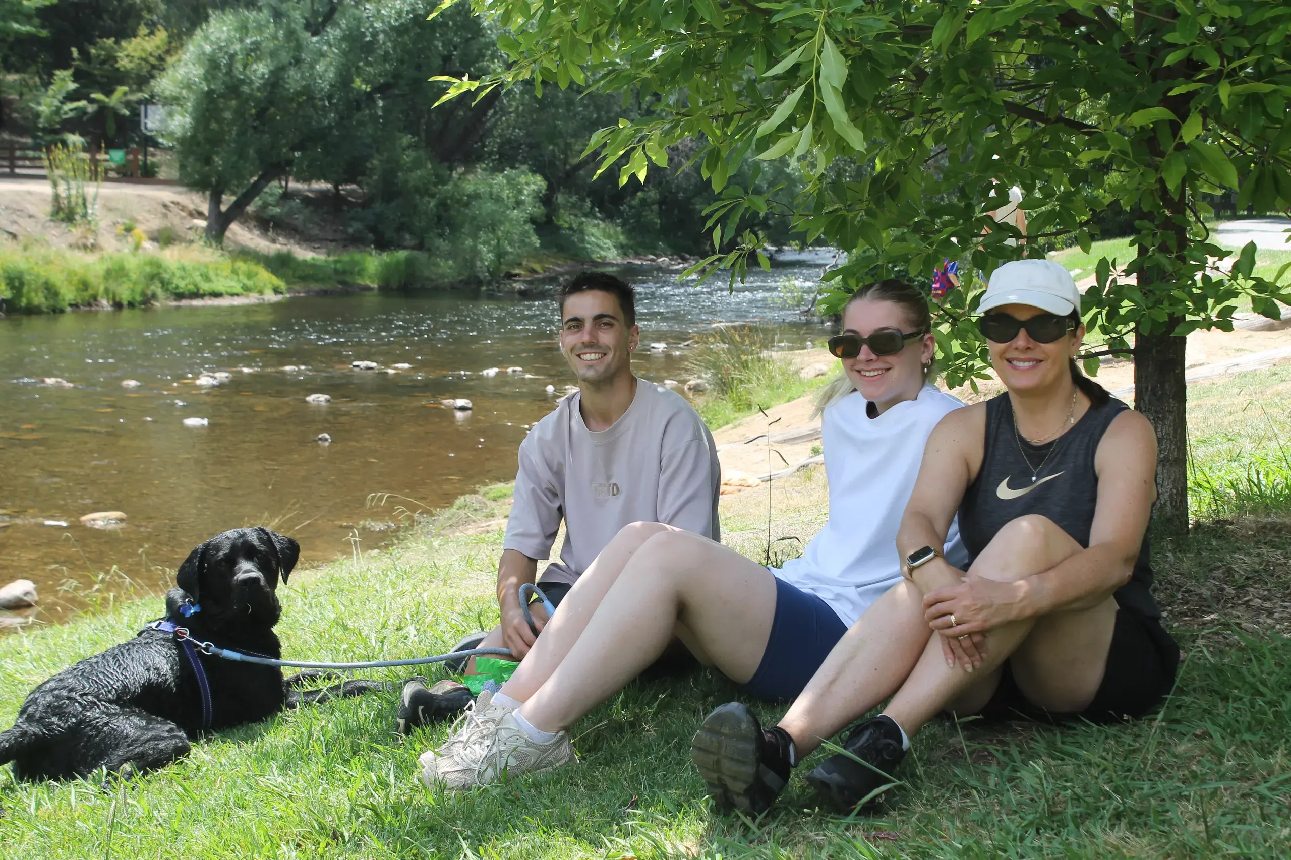 <p>KEEPING COOL THIS SUMMER:  After walking from their holiday rental in Porepunkah, Dougie the Labrador-Golden Retriever-Cross, Louis Chidiac and Georgia and Jane Richardson, dropped by Howitt Park in Bright for a paddle before the weather became too hot on Friday. PHOTO: Phoebe Morgan</p>\\n