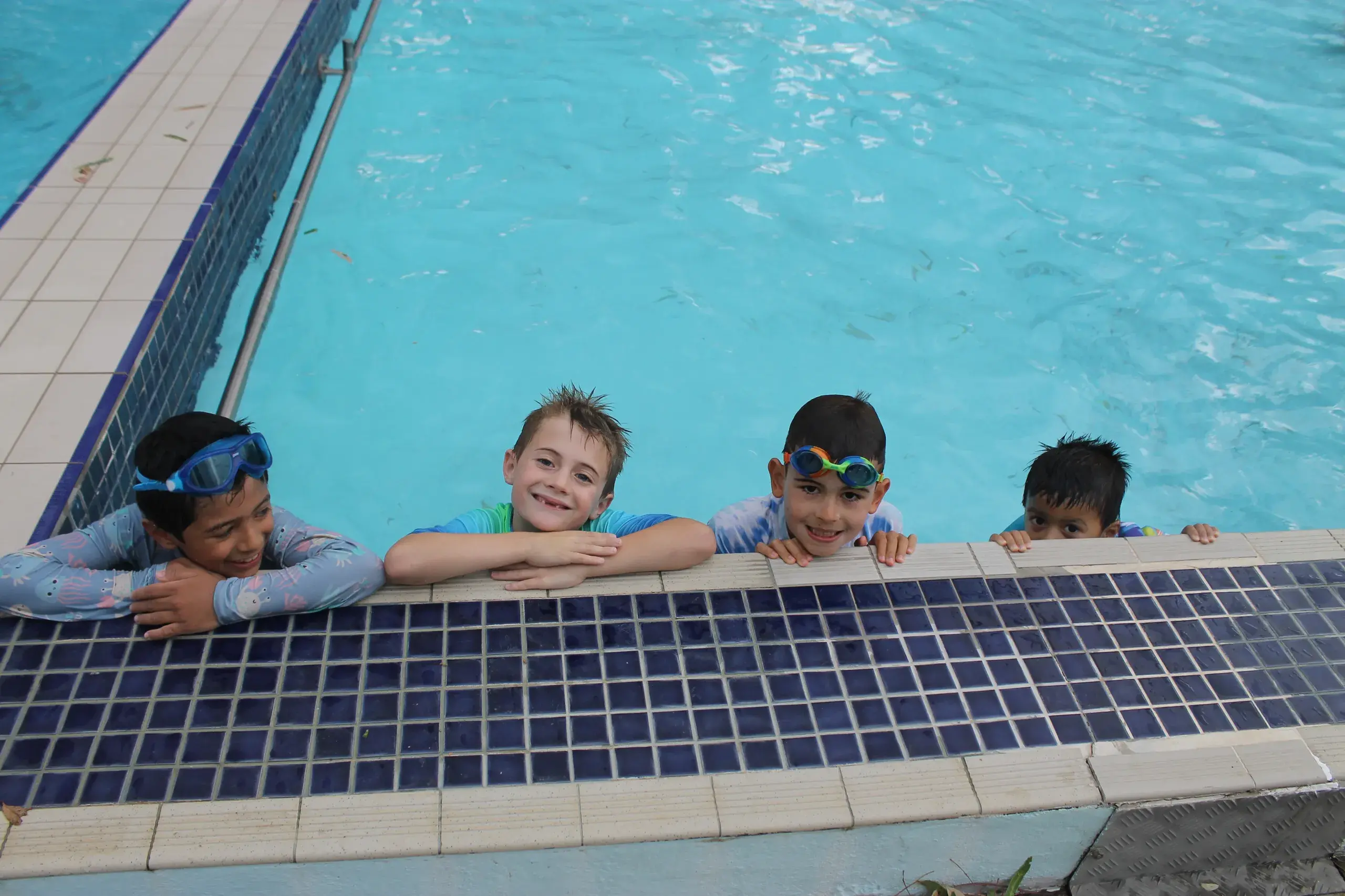 <p>SWIMMING THROUGH SUMMER HEATWAVE: Keeping cool at the Myrtleford pool during last week\\'s heatwave were (from left) Ahrooj Khadka, Carlo and Keeley Sgambelloni and Ajay Khadka. PHOTO: Phoebe Morgan</p>\\n