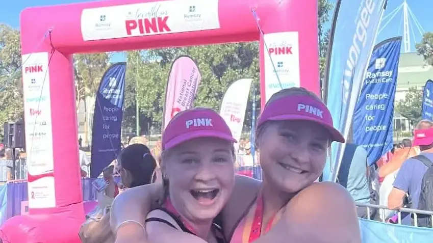 Determined duo ran, swam and biked to raise funds for National Breast Cancer Foundation