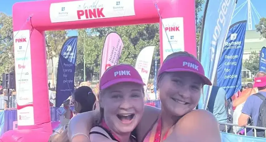 Determined duo ran, swam and biked to raise funds for National Breast Cancer Foundation