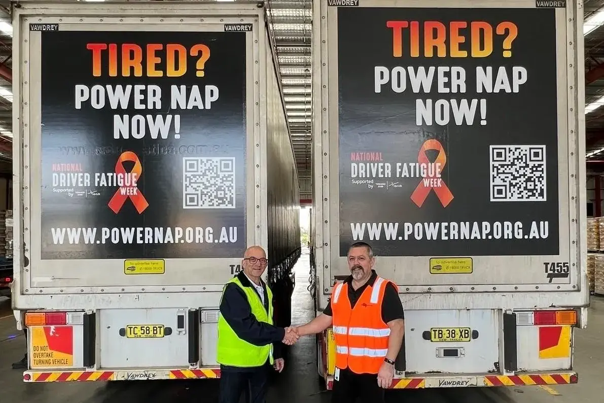 <p>TIME FOR A NAP: Founder of Truck Ads Rob McKay with Maurice Alexander promoting the vital Power Nap message, which now appears on trucks, digital platforms and workplace safety programs across Australia.</p>\\n