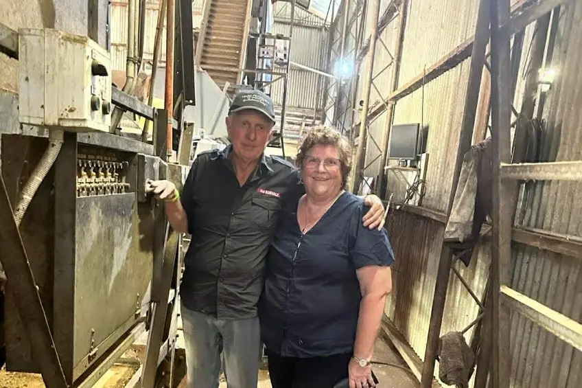 <p>ONE LAST HURRAH: Neville and Donna Hancock, with dog Rosie, shut down the machine for the last time at their final harvest. </p>\\n