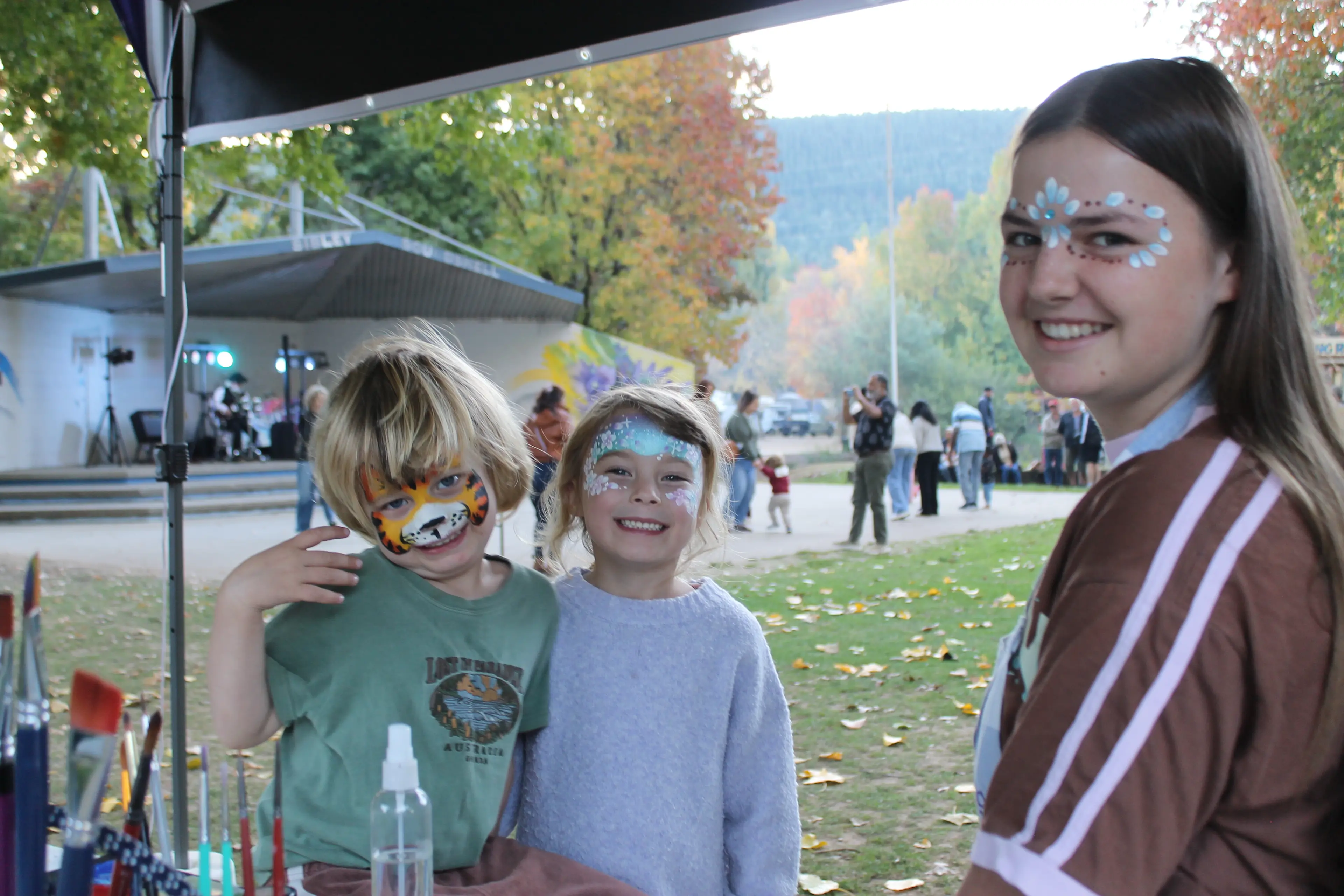 <p>FIRST STOP- FACE PAINTING! (from left) Hugo and Riah Nelson dropped by the North East Face Painting stall at last week\\'s Bright Autumn Festival Opening Ceremony and asked Victoria Thomas for their favourite designs. PHOTOS: Phoebe Morgan</p>\\n