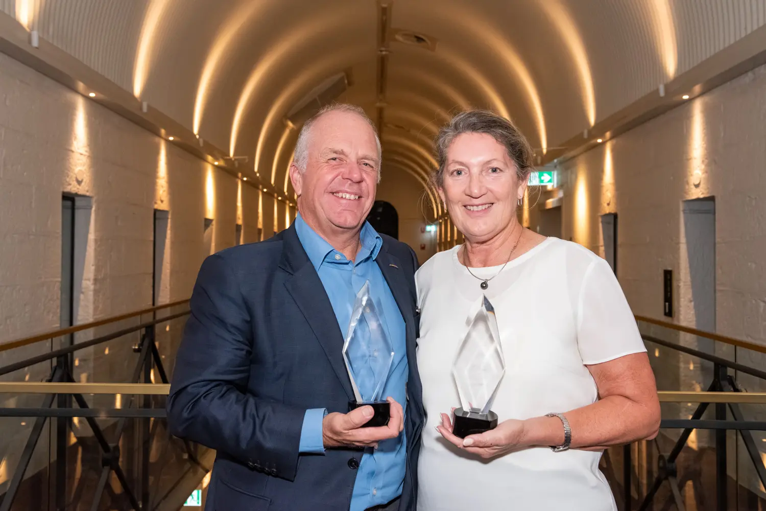 <p>TWIN TROPHIES: Owners of Sun Cinemas in Bright, Mark and Anne Smith, received their ICA awards from current CEO Nick Hayes for their hard work running an independent film house. PHOTO: Sun Cinemas</p>\\n