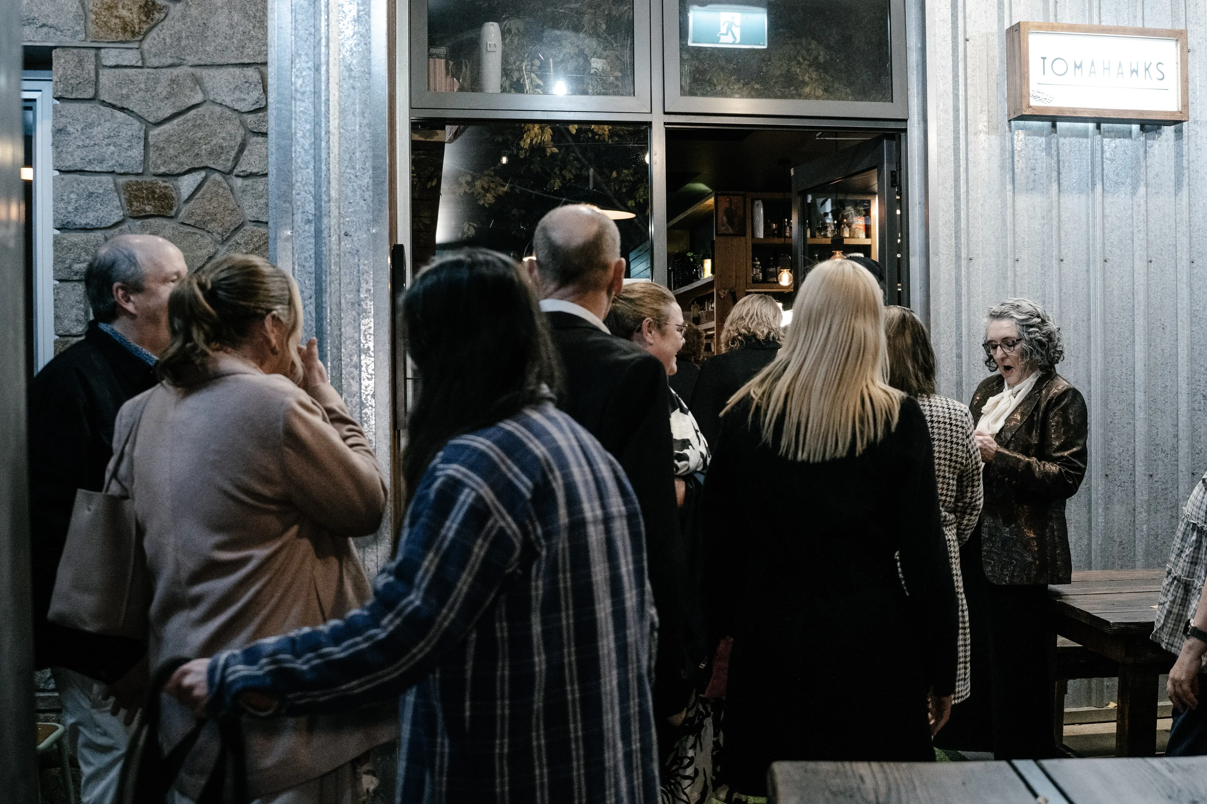 <p>STEP RIGHT UP: Amanda welcomes her group to Tomahawks; their latest stop on an adventurous gastronomic evening. PHOTO: Bright Chamber of Commerce.</p>\\n