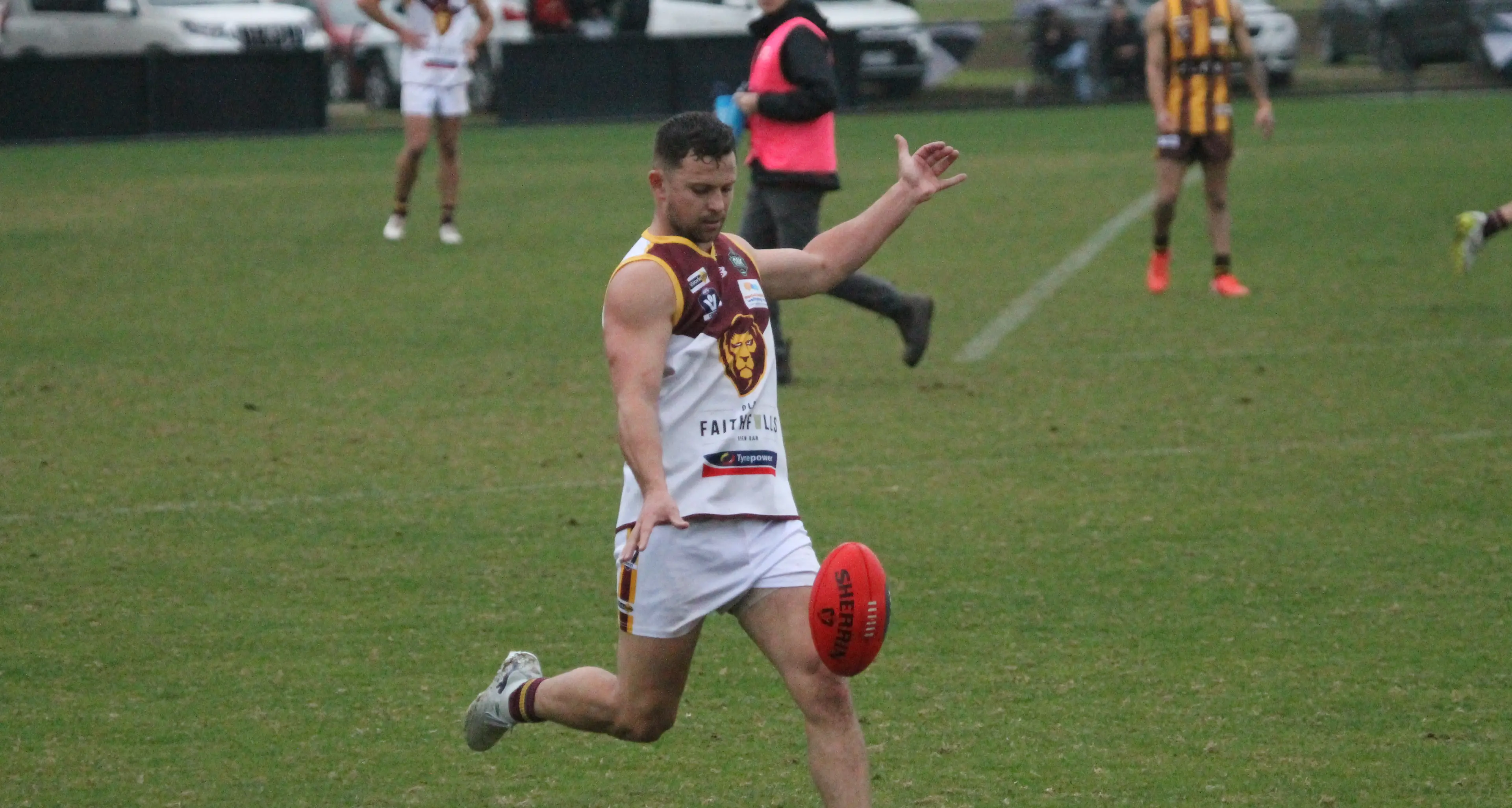 Lions claim top spot from Hawks