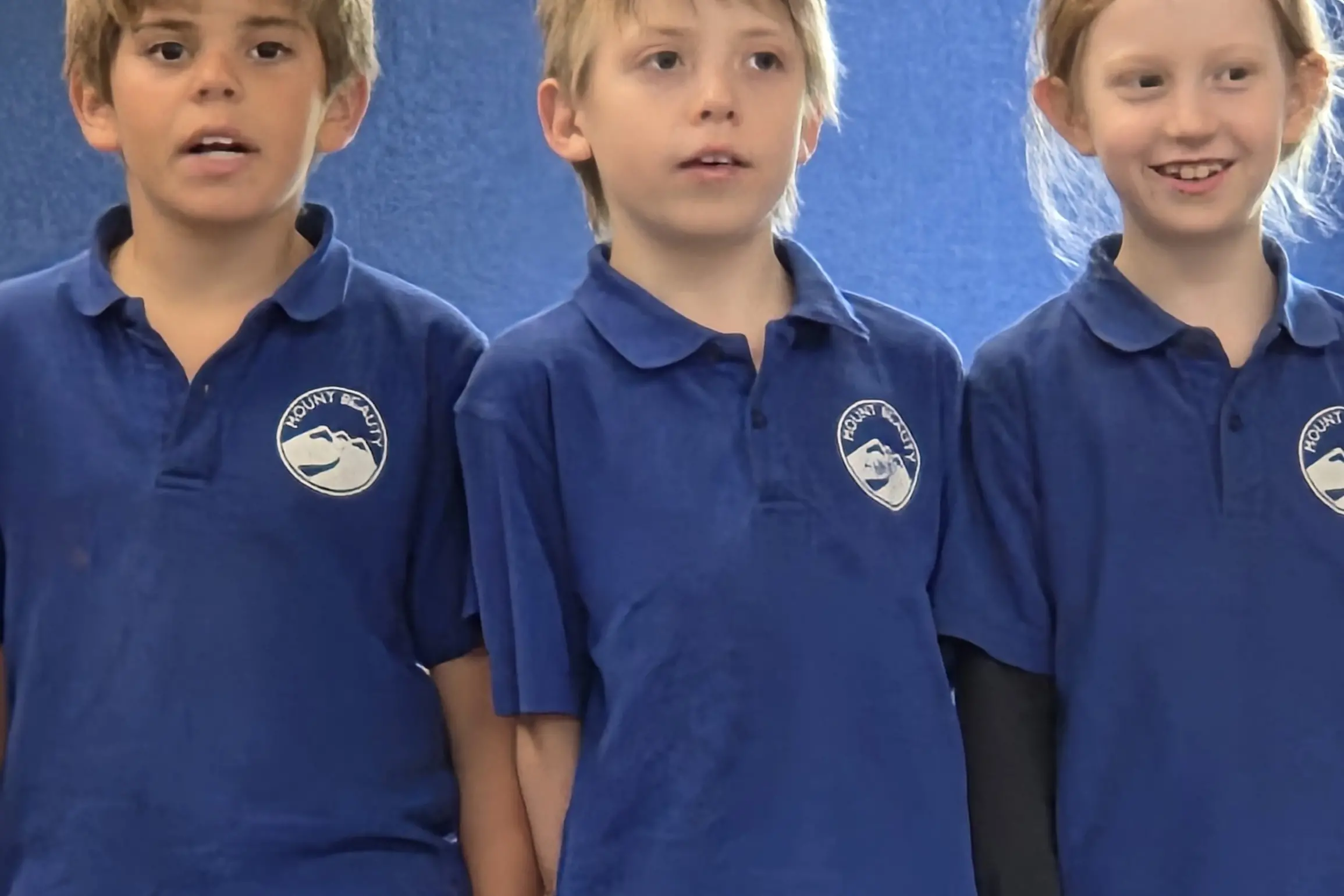 <p>STUDENTS HIT A HIGH NOTE: Mount Beauty Primary School students (from left) Orlonzo Perri, Harri Brewergray and Bridie Matheson sing up a storm in the \\u2018Children Sing\\u2019 concert. </p>\\n