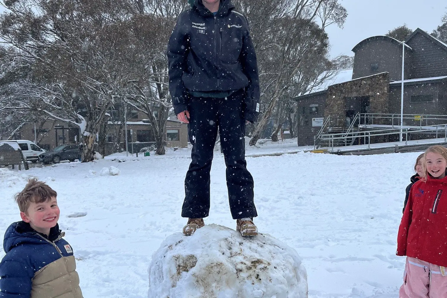 <p>HAVING FUN: Bright P-12 College Dinner Plain campus has more than 50 students this term, including (from left) Bill Gunn, Edward Watson (standing on giant snowball), Emma Gunn and Ashley Anagnostou.</p>\\n