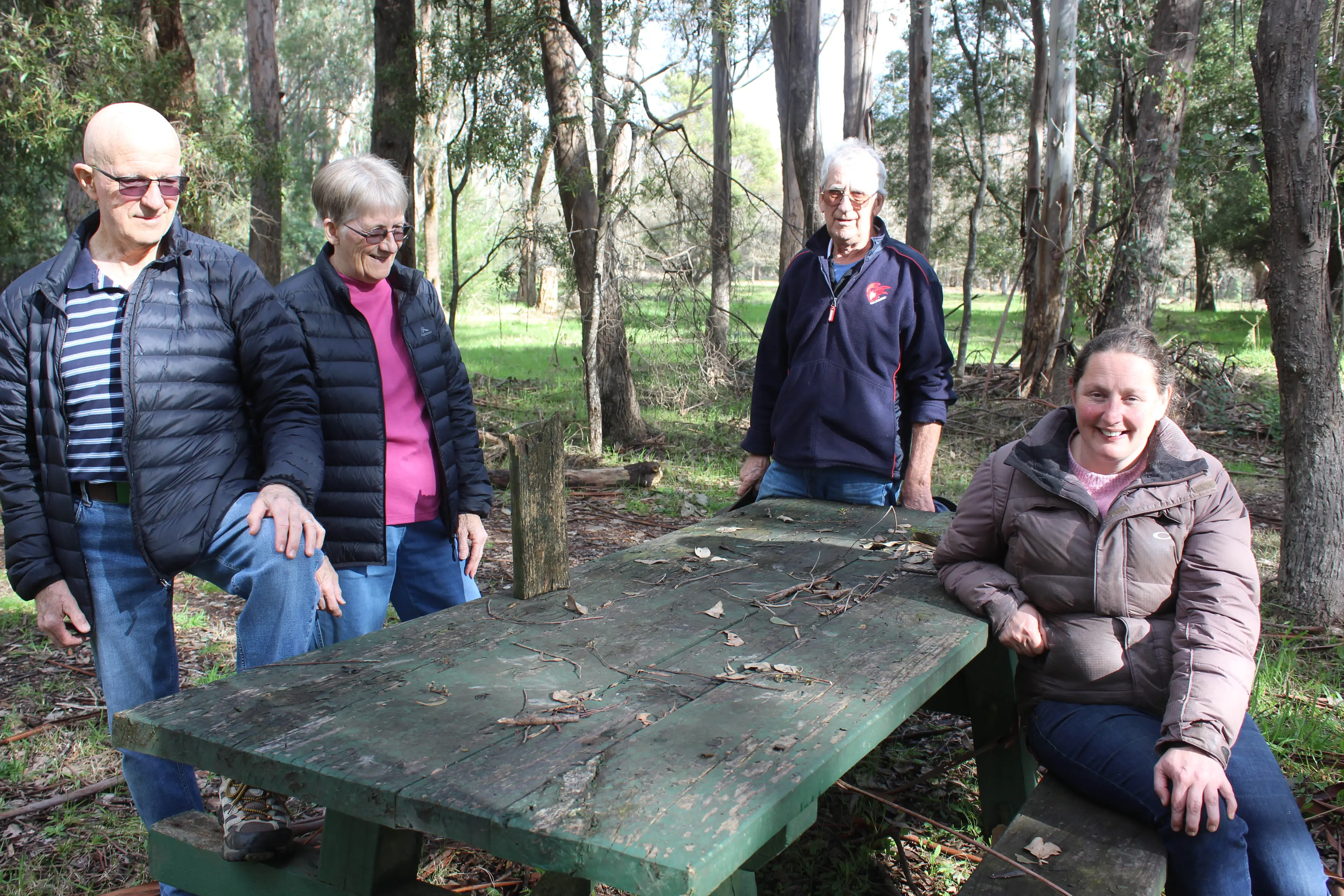 <p>DELIGHTED: Wandligong Preservation Society Inc. members (from left) Rugby and Lyn McLean, Ken Grummisch and president Kath Healy are looking forward to replacing the outdoor furniture throughout the Wandilgong Diggings. PHOTO: Jenny Zamperoni</p>\\n