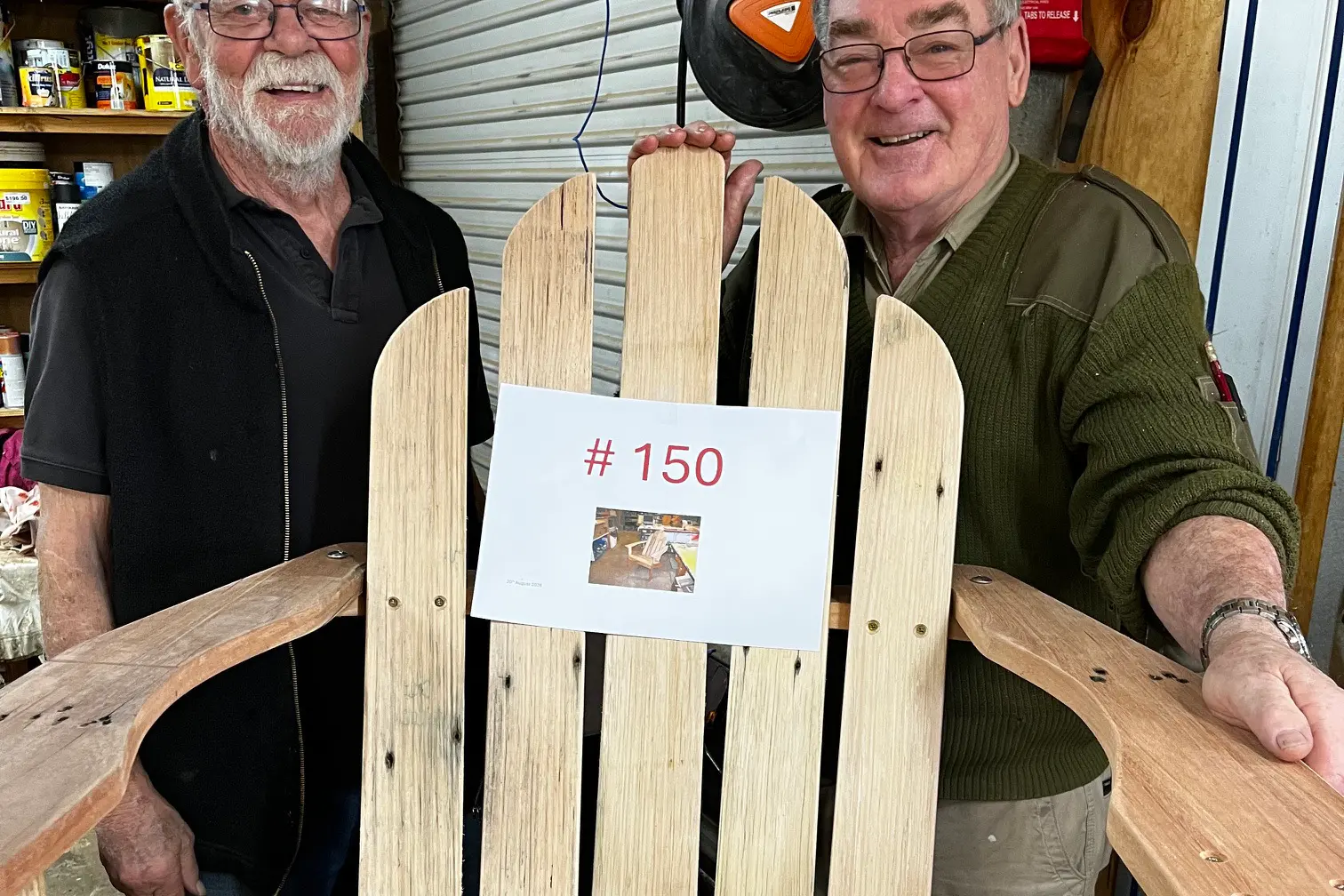 <p>CRAFTY WORK: Myrtleford Men\\'s Shed president Trevor Isherwood and member Clive Walker OAM, are pictured with the 150th Adirondak Chair constructed by the Myrtleford Mens\\u2019 Shed. </p>\\n