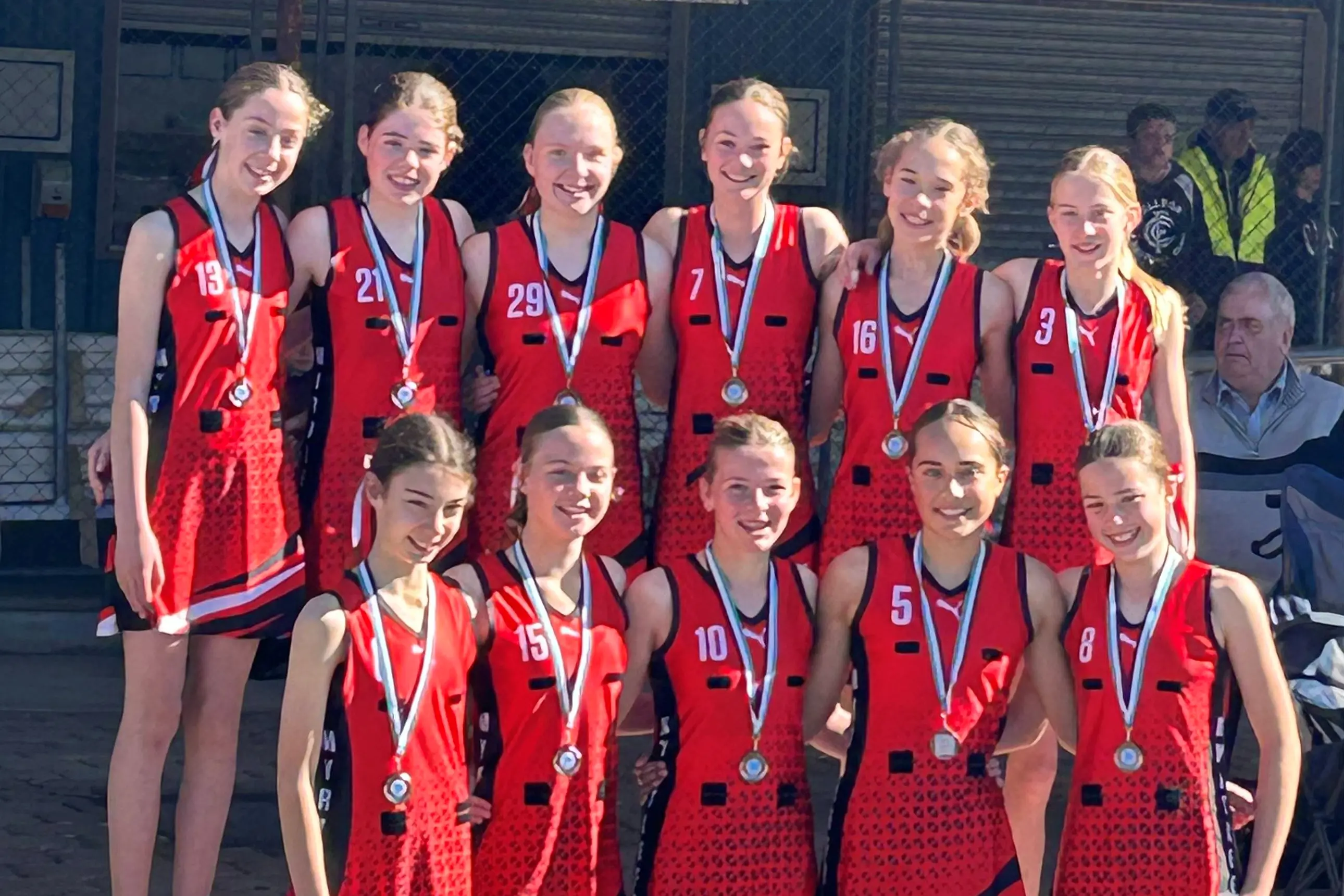 <p>WELL PLAYED: The Myrtleford Black development netball team of (back, from left) Niamh McManus, Violet McKeone, Imogen Mroz, Harriet Earl, Evie Petricevich, Lila Murray, (front, from left) Lexi Piazza, Charlotte Koers, McKenzy Reynolds, Zoe Petricevich, and Ella Way came up four goals shy in their grand final.</p>\\n