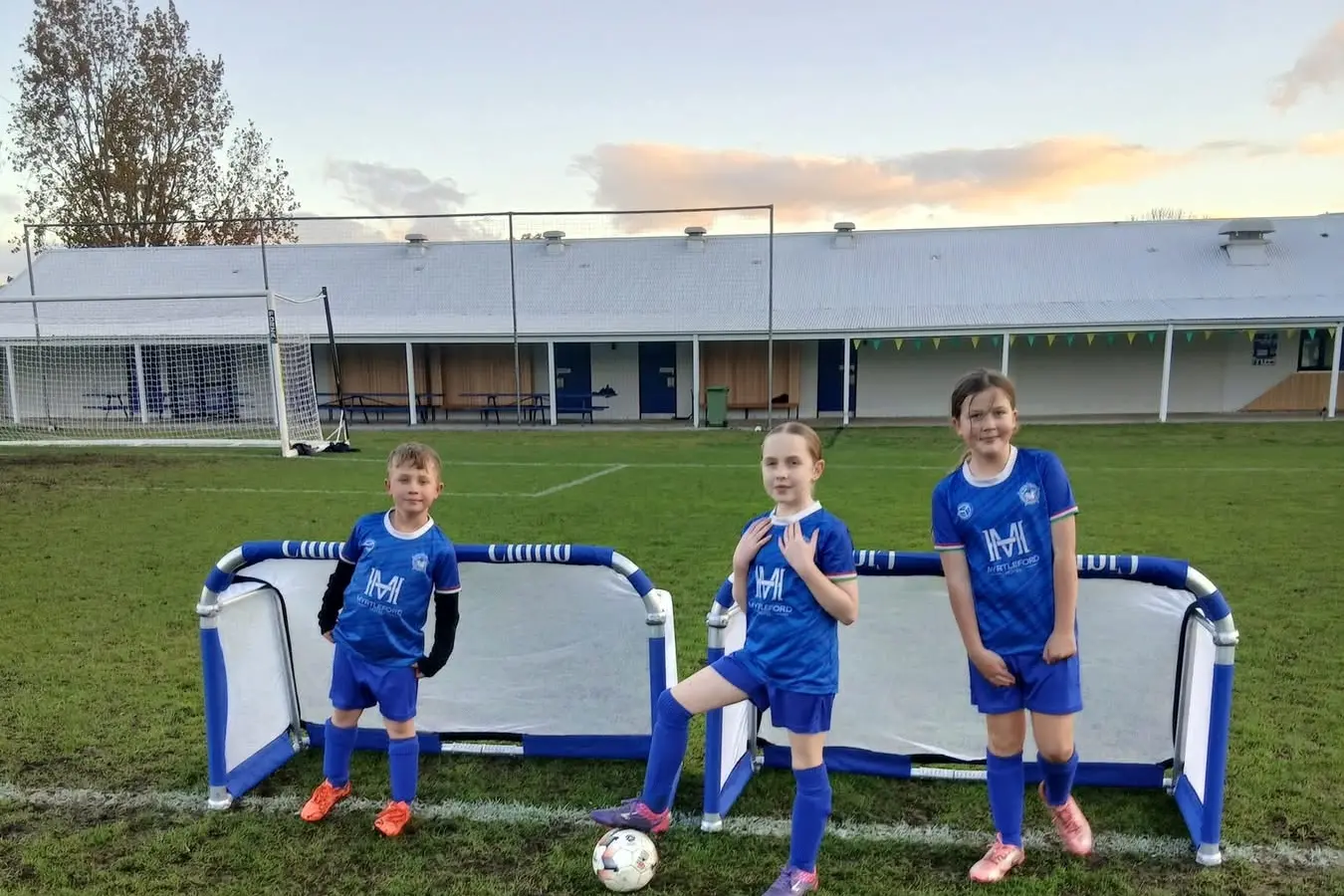 <p>GOALS MET: MiniRoos participants John Fischer Smith, Neeve Shaw and Tessa Grace are thrilled with their new goals. </p>\\n
