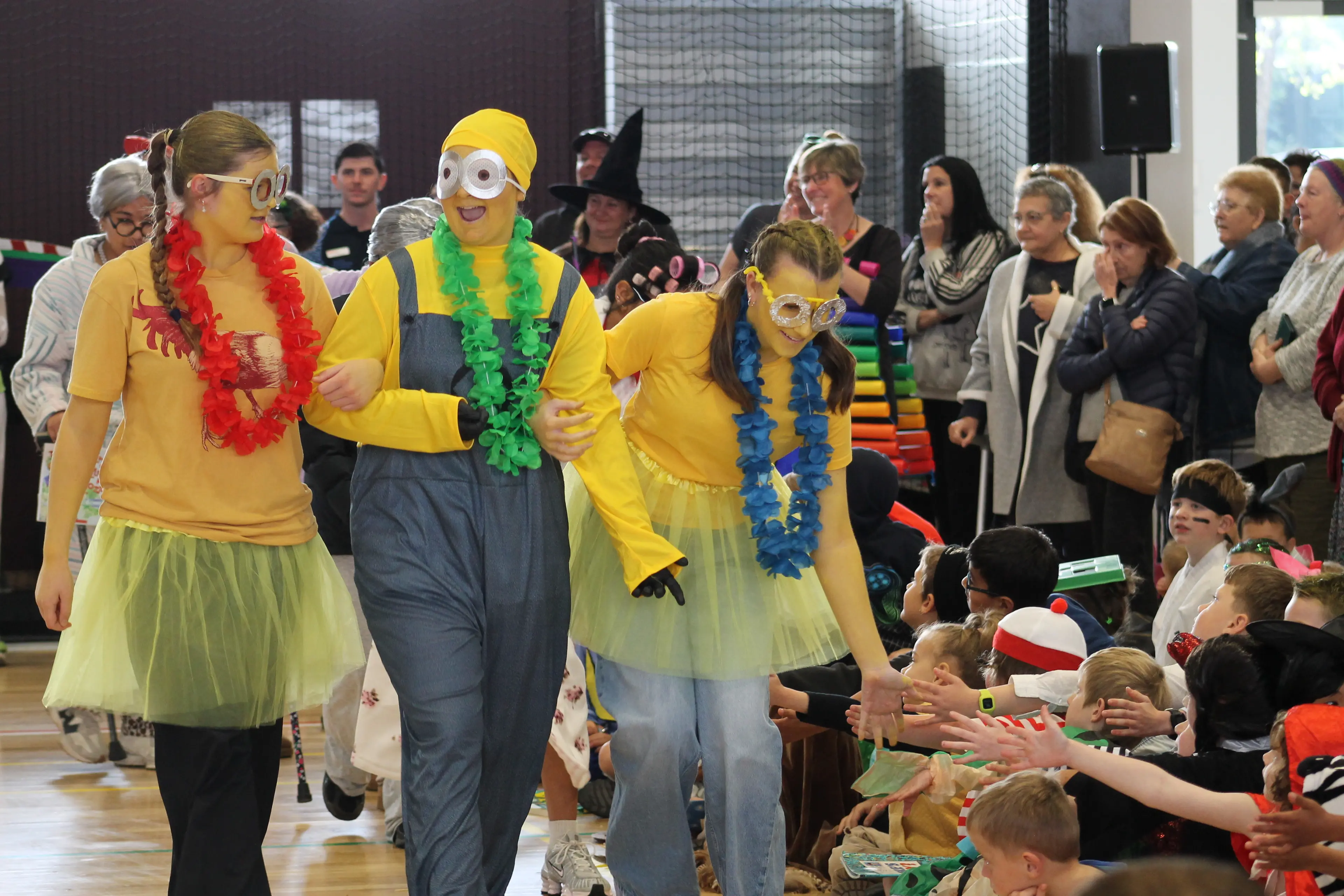 <p>APPRECIATIVE AUDIENCE: Eliza Humphries, Zoe Roberts and Amelia Heatley made a very yellow statement as a trio of Minions from the \\'Despicable Me\\' universe. PHOTOS: Phoebe Morgan</p>\\n