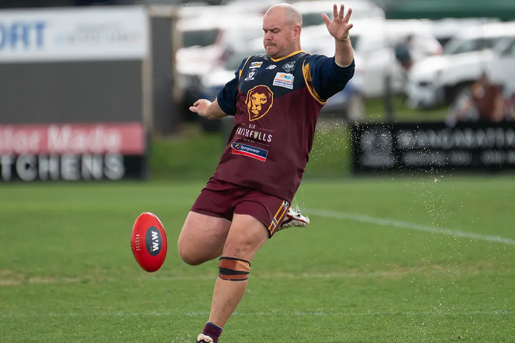 <p>FOUR TEAMS IN THE BIG DANCE: Jakeb Meyer will look to boot the reserves Lions to premiership glory. PHOTO: Melissa Beattie</p>\\n