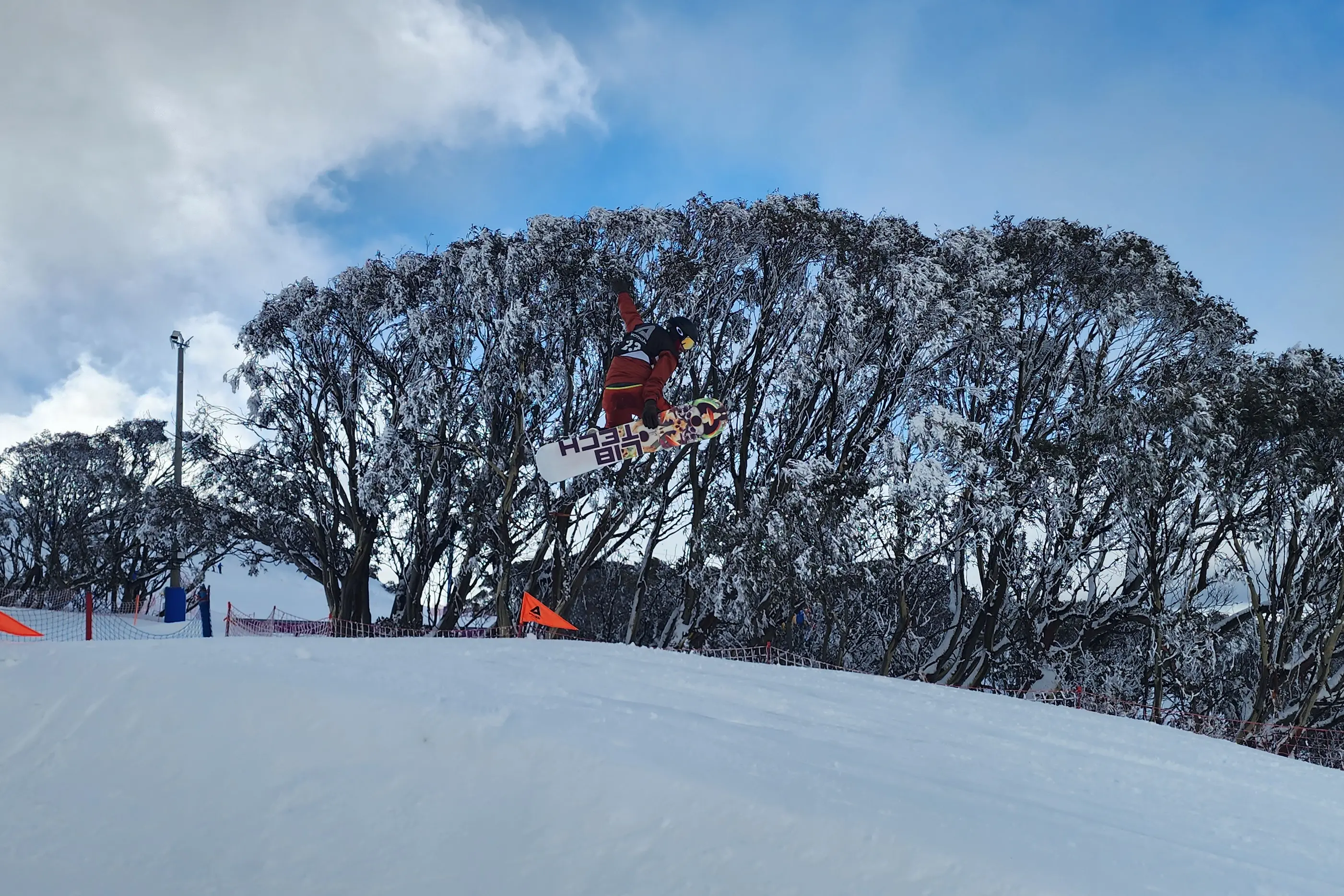<p>HANG TIME: One of the competitors gets plenty of air during the snowboard slopestyle event.</p>\\n