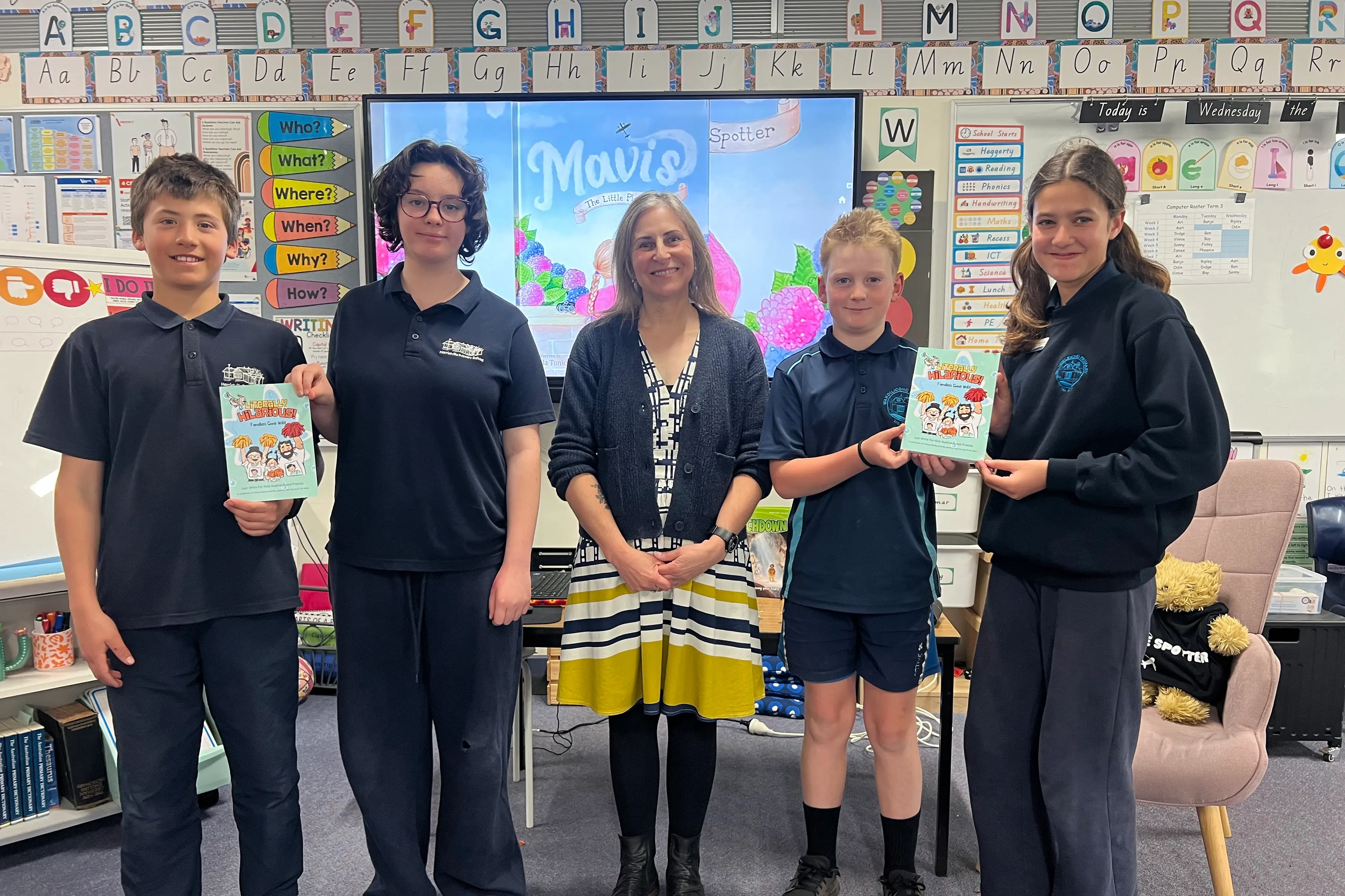 <p>PAGE-TURNING PUPILS: Harrietville Primary School students (from left) Thomas Dinnendahl and Rosalee Whittaker-Gard, welcomed special guest speaker and author Angela Toniolo, along with Wandiligong Primary School students Kai Pywell and Eloise Clyne and their classmates in honour of this year\\'s Book Week celebrations. PHOTO: Harrietville Primary School</p>\\n