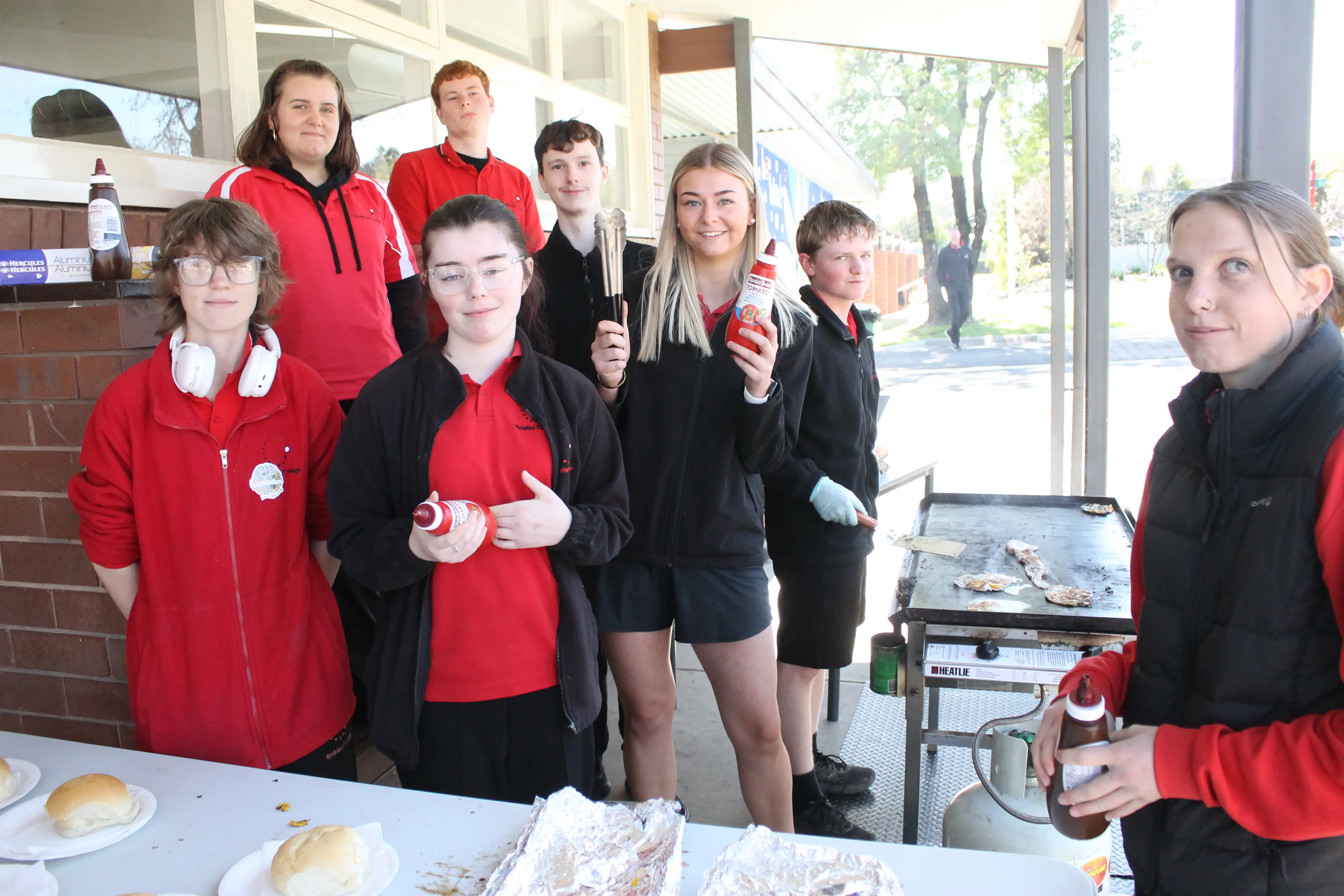 <p>BUSTLING BREAKFAST: Several of Myrtleford P-12 College\\'s VM students, including (back row, from left) Joy Hunter, Archie Naylor, Patrick Vesty, Sienna Schell and Dustyn Everard, with (front row) Sapphire Collett, Indi Lindbolm and Tash Crowe each took charge of their workstations for The Daily Grind Cafe\\'s morning rush. PHOTO: Phoebe Morgan</p>\\n