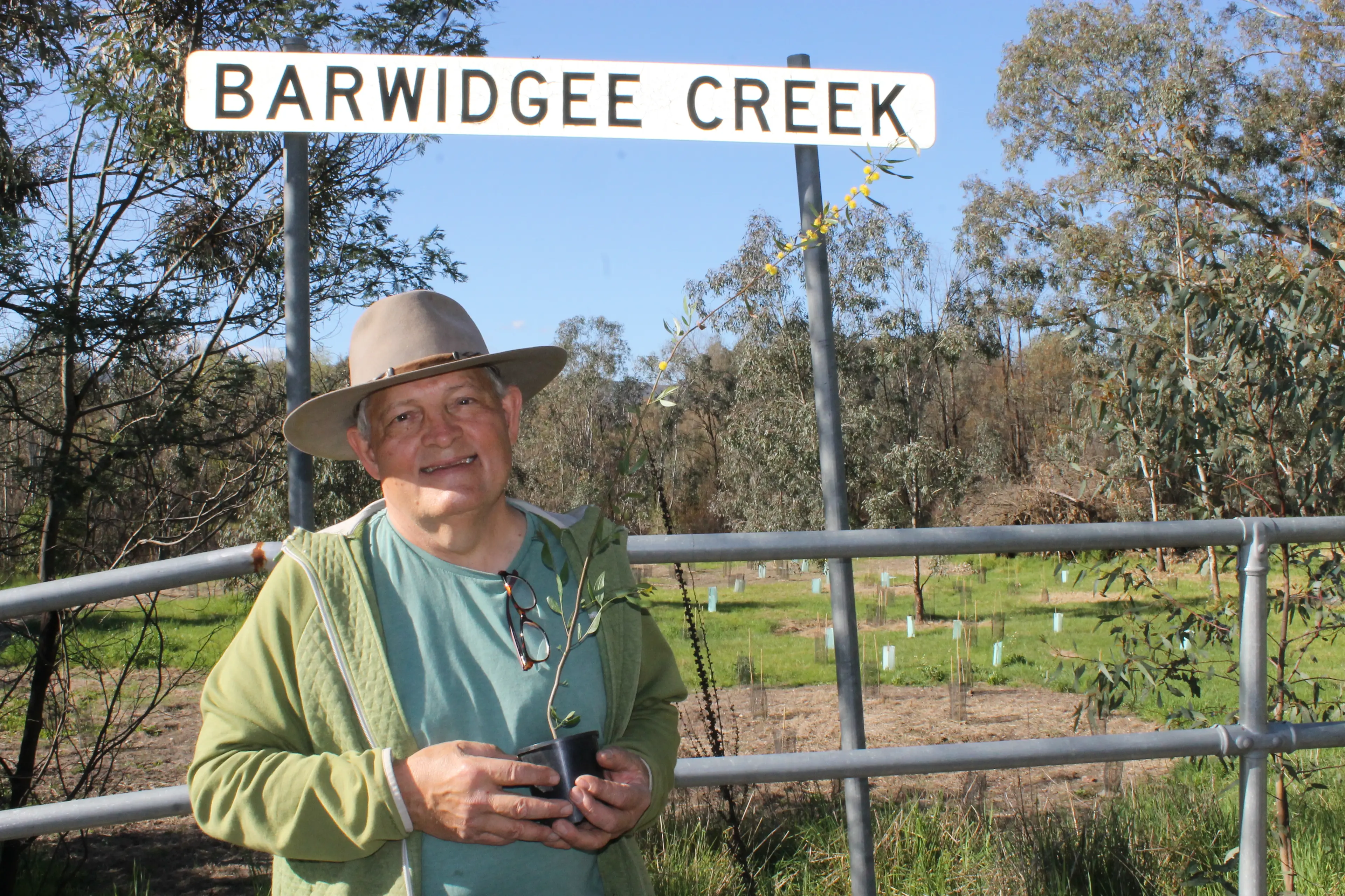 <p>WATTLE WE DO WITH THIS REHABILITATED REGION? Myrtleford Landcare president, Paul Reser, was grateful for the start GROW Myrtleford+ gave the local environmental group and said they had ongoing plans for improvements at Barwidgee Creek, including the addition of a new wattle seedling. PHOTO: Phoebe Morgan</p>\\n