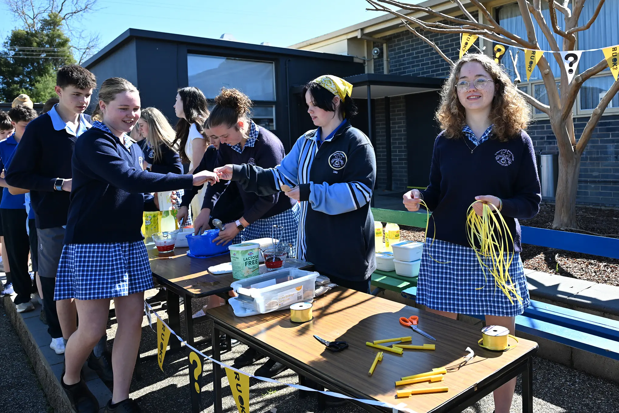<p>CONNECTING TOGETHER: A bright yellow ice cream spider stand was a fun way to bring everyone together for R U OK? Day at Marian College.</p>\\n