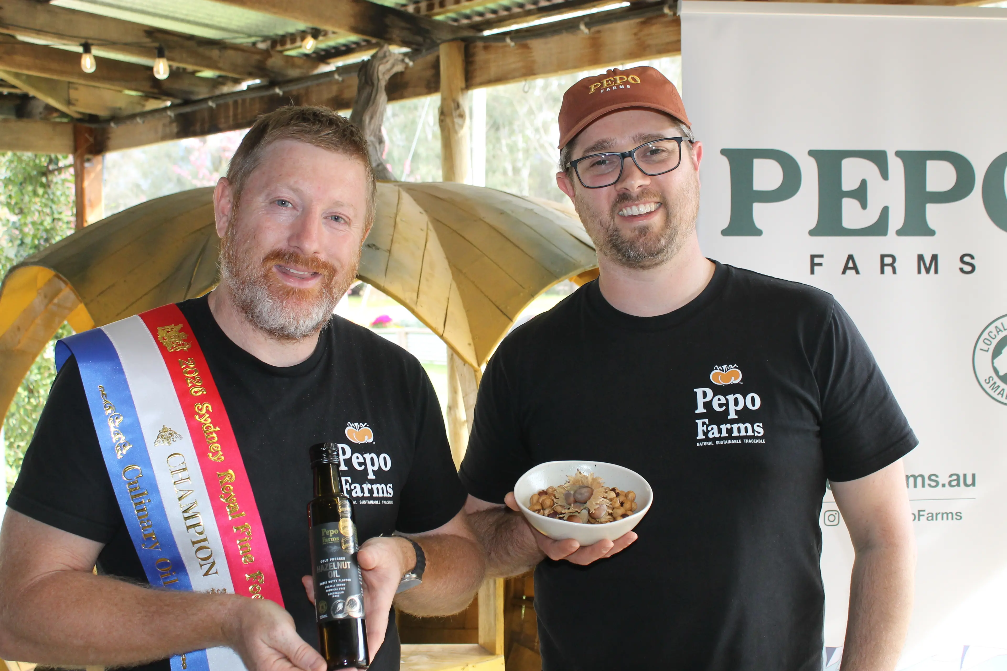<p>FROM OVENS TO AUSTRALIA\\'S CHAMPION OIL: Pepo Farms co-owner Jay Rivett, and Dan Pusvacietis are tremendously proud of the team after their \\'Cold Pressed Hazelnut Oil\\'s\\' recent win. PHOTO: Phoebe Morgan</p>\\n