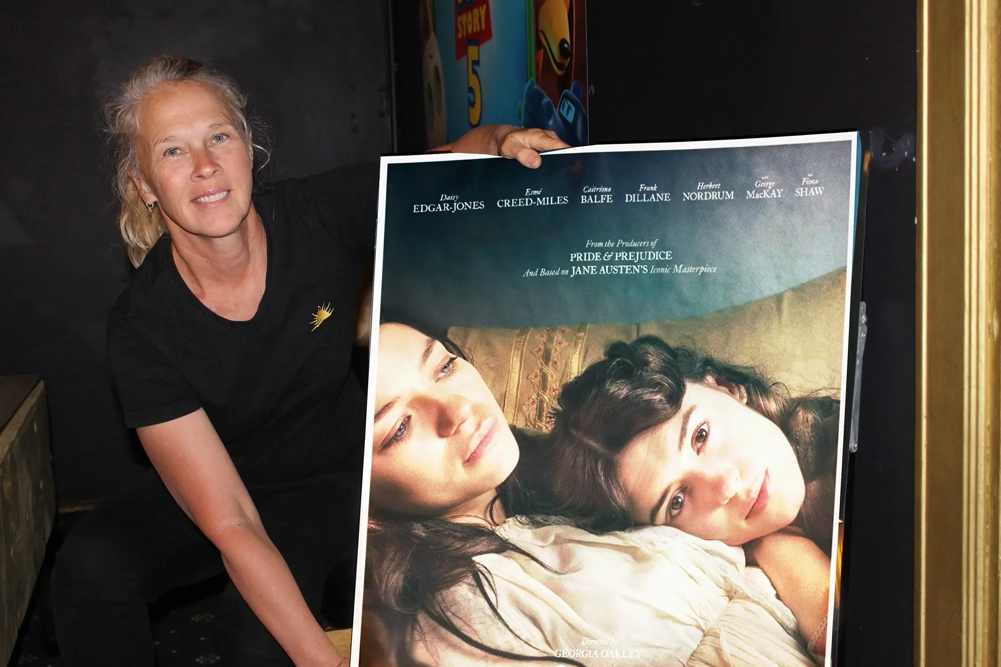 <p>GET THE POPCORN READY: Sun Cinema Bright employee, Jo Holland was busy arranging promotional posters last week, to let local literature and film-lovers know about this new Austen adaptation. PHOTOS: Phoebe Morgan.</p>\\n