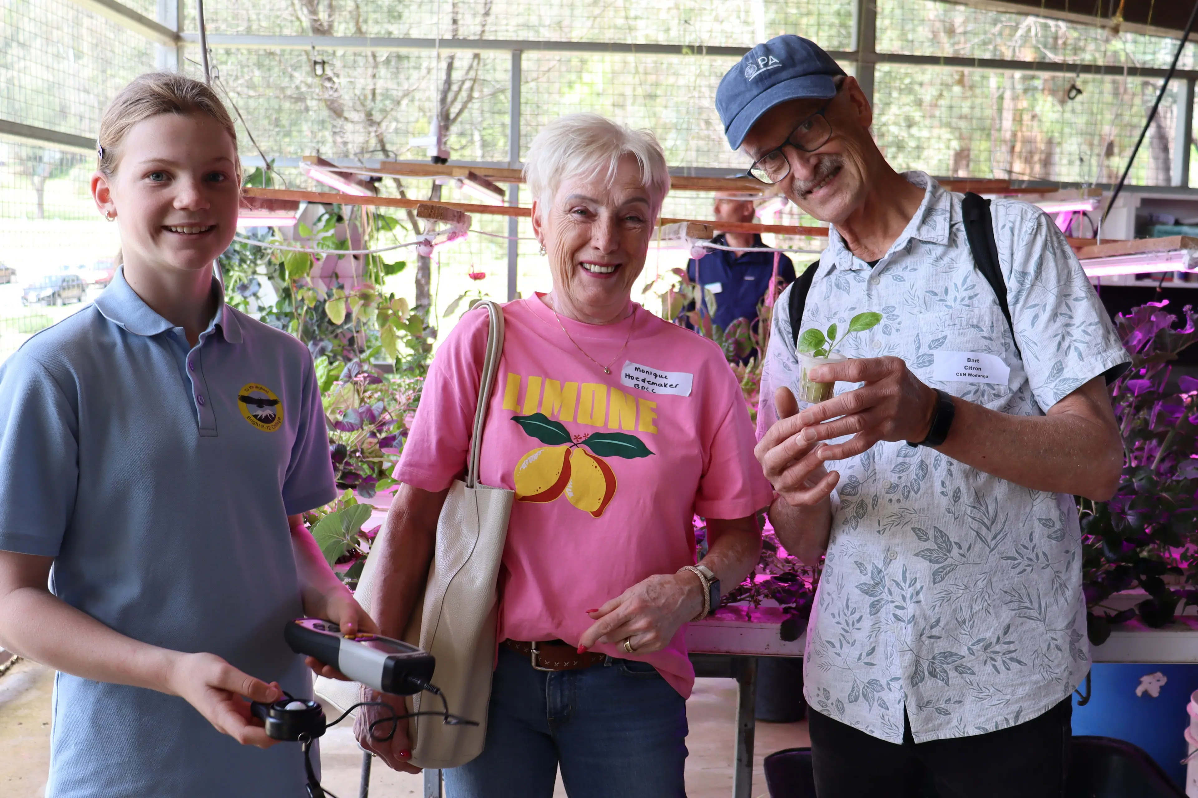 <p>GREEN THUMBS: Bright P-12 College student Zoe Caswell with Monique Hoedemaker from Bright & District Chamber of Commerce, and Bart Citroen from Community Energy Network. PHOTOS: Bright P-12 College.</p>\\n